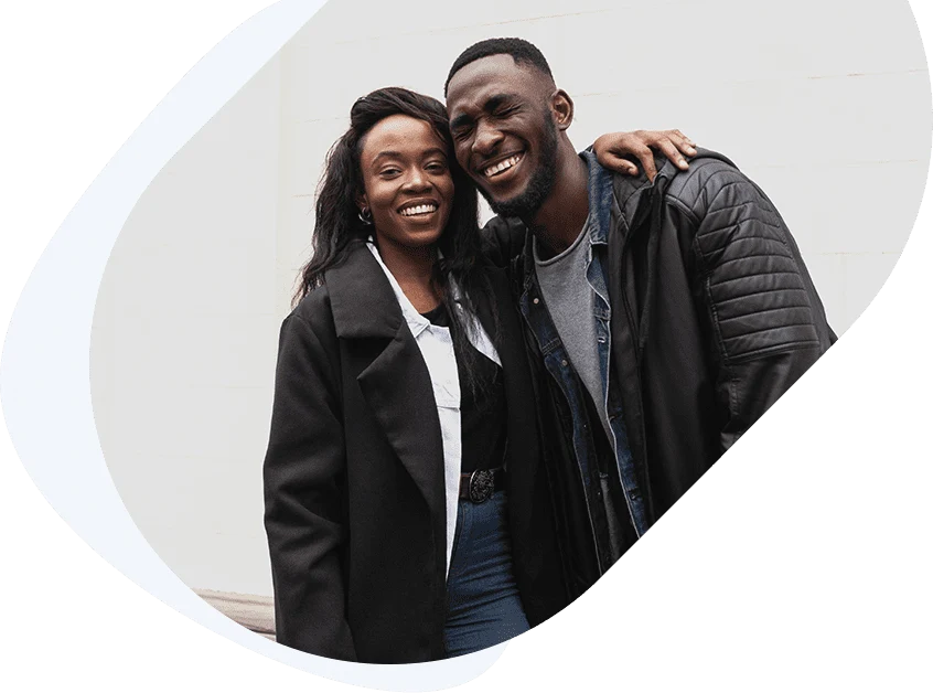 Happy Couple Celebrating a $200 Loan Approval