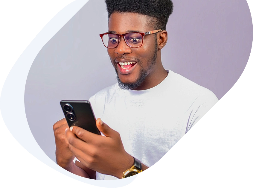 Happy man after receiving fast approval for a $100 loan on his phone