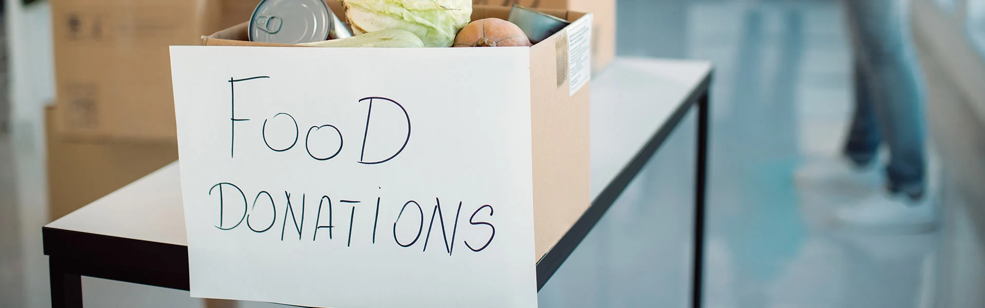 Food donation basket with fresh vegetables for families lacking grocery money
